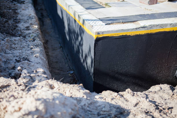 Professional Waterproofing technician working in Brice, OH
